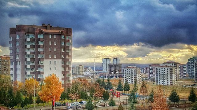 CLOUDY SKY OVER CITY