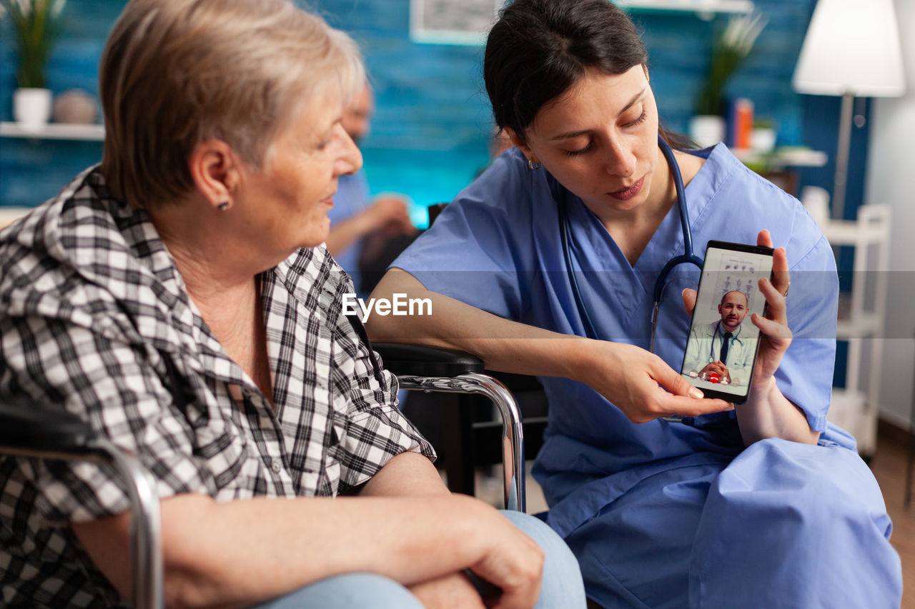 Doctor consulting patient via video call