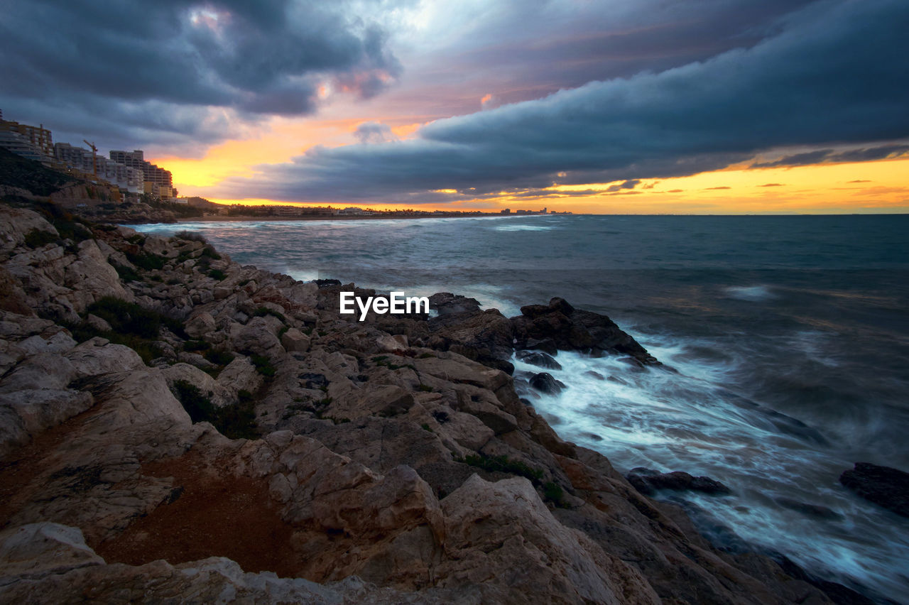 Scenic view of sea against sky during sunset