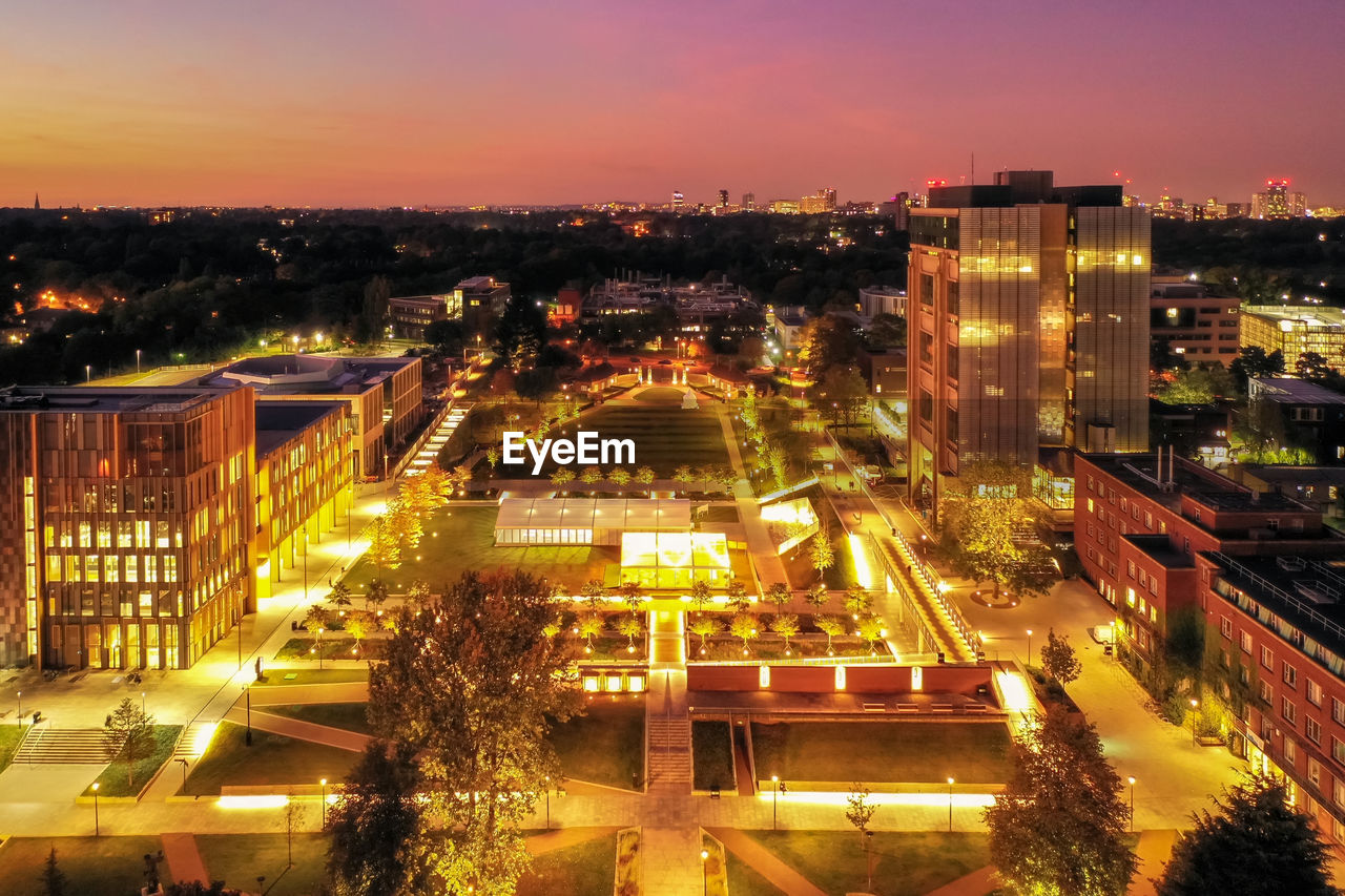 High angle view of illuminated cityscape at night