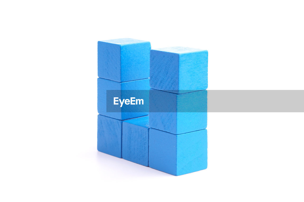 Close-up of blue toy blocks against white background