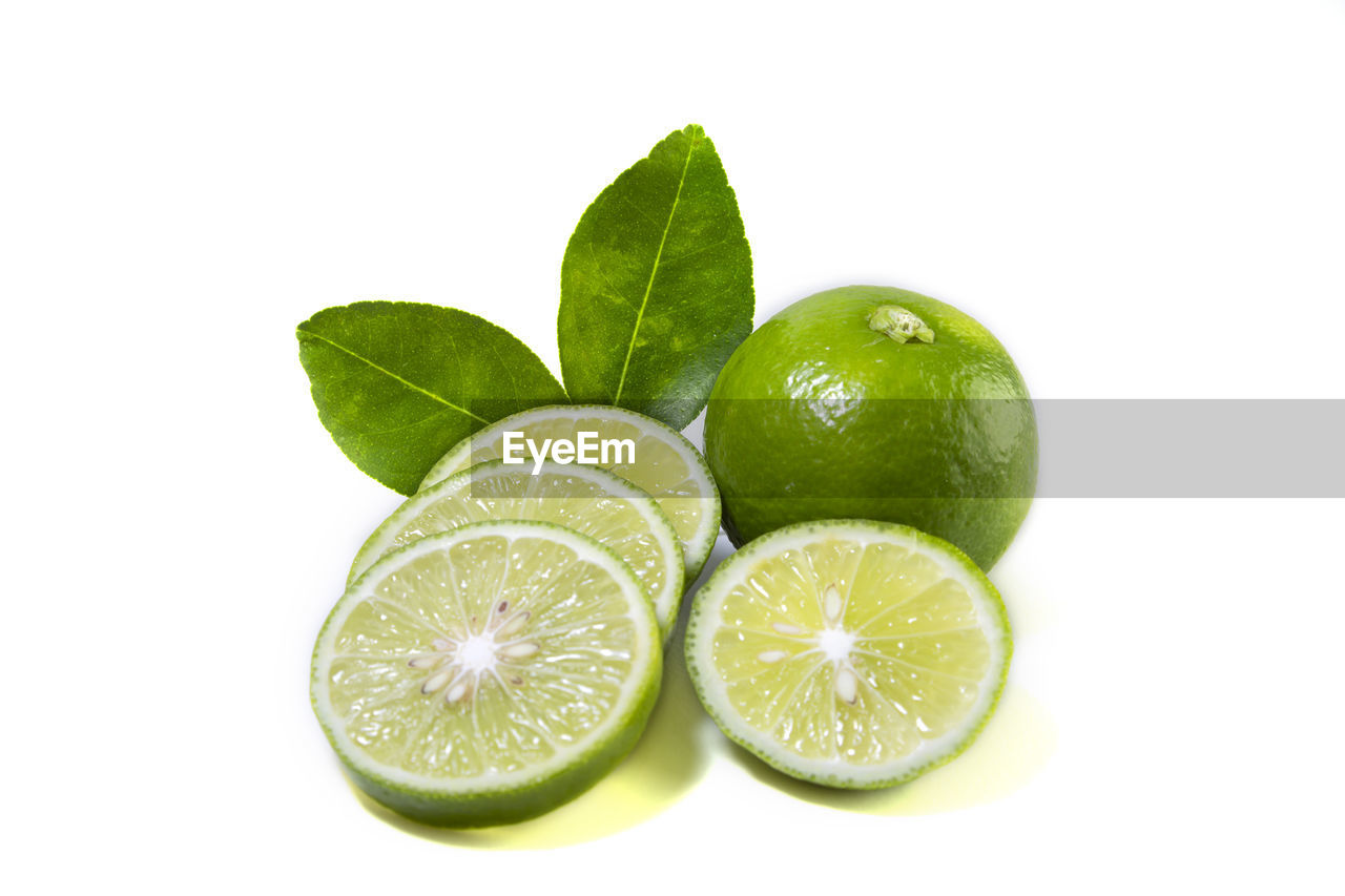 CLOSE-UP OF GREEN FRUITS