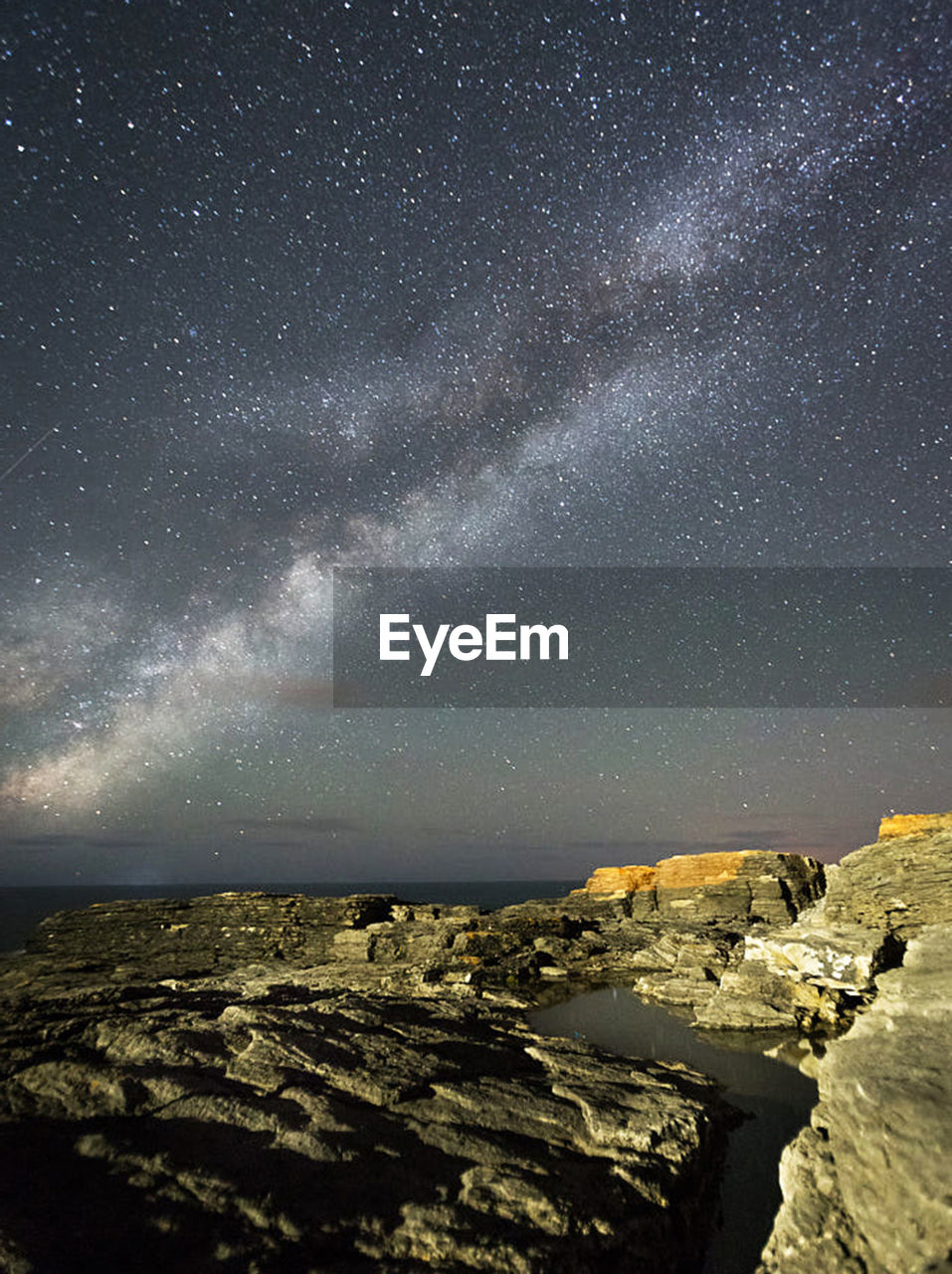 Aerial view of sea against sky at night