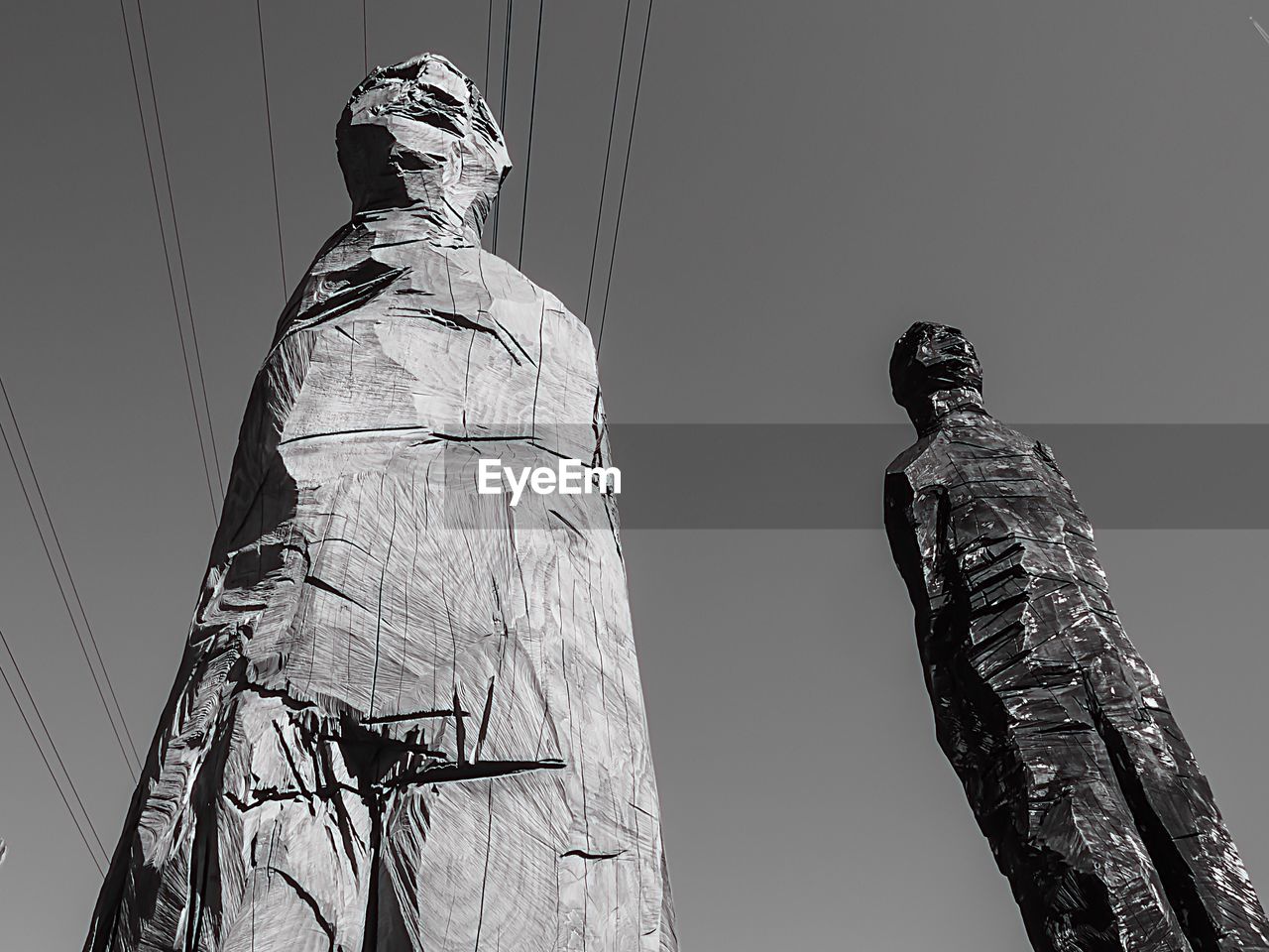 LOW ANGLE VIEW OF STATUE