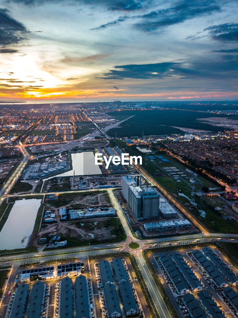 Aerial view of cityscape during sunset