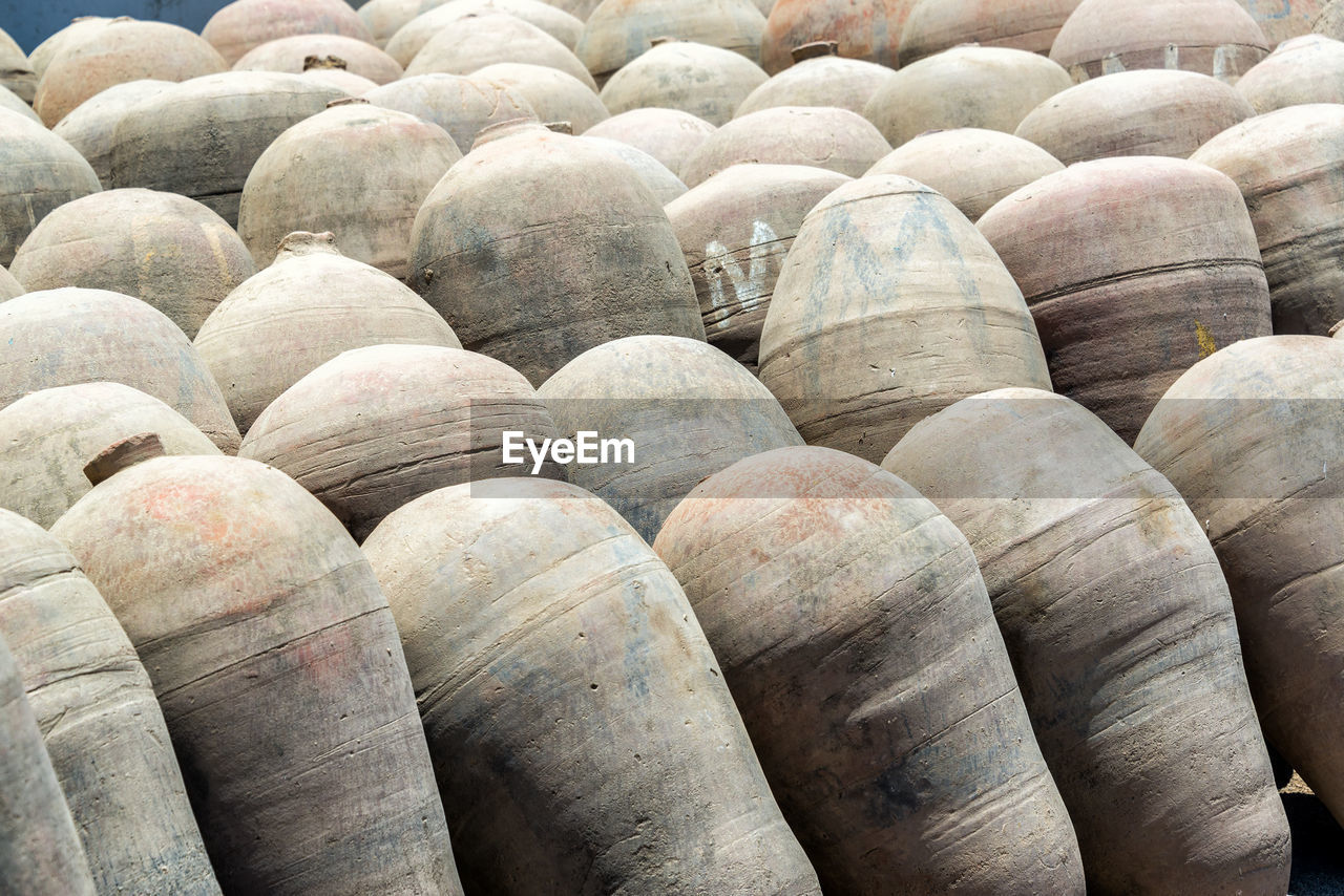 FULL FRAME SHOT OF STACK OF STONE