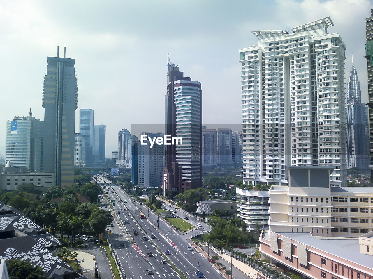 Panoramic view of city buildings against sky