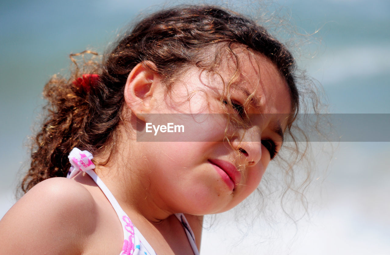 CLOSE-UP PORTRAIT OF A GIRL