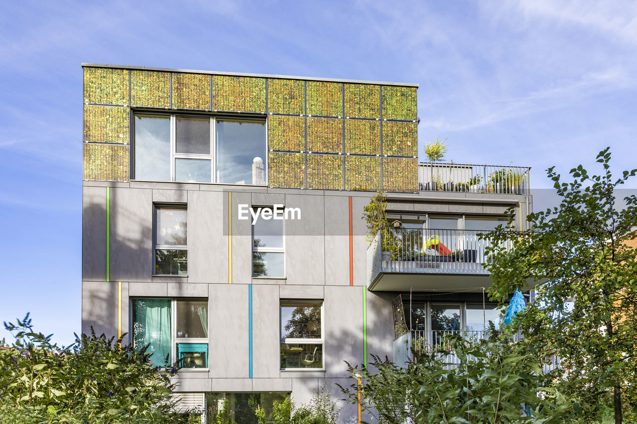 Germany, baden-wurttemberg, tubingen, modern energy efficient apartment building in lustnau quarter