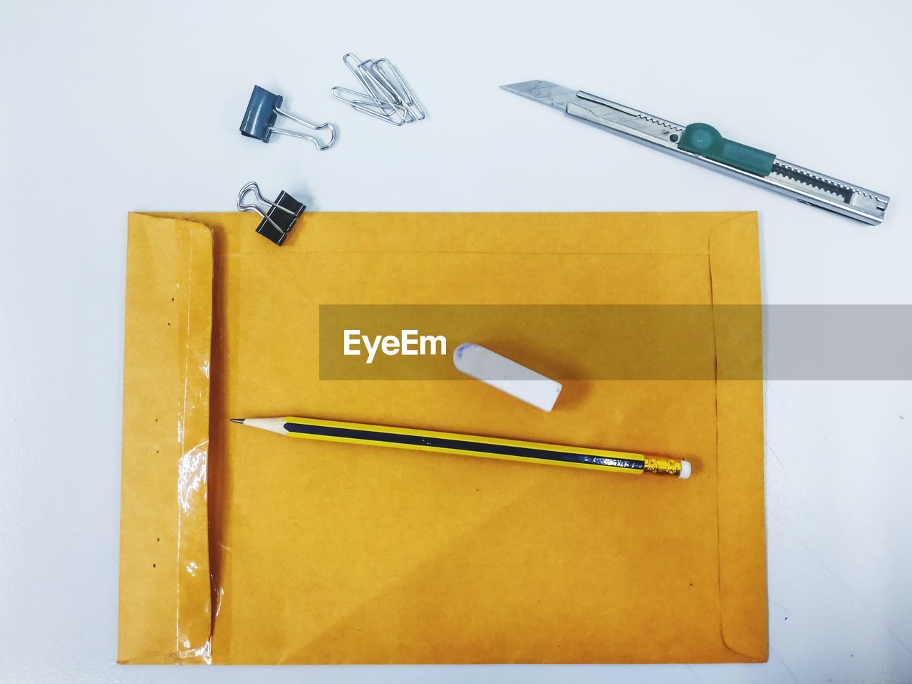 HIGH ANGLE VIEW OF PENCILS ON TABLE