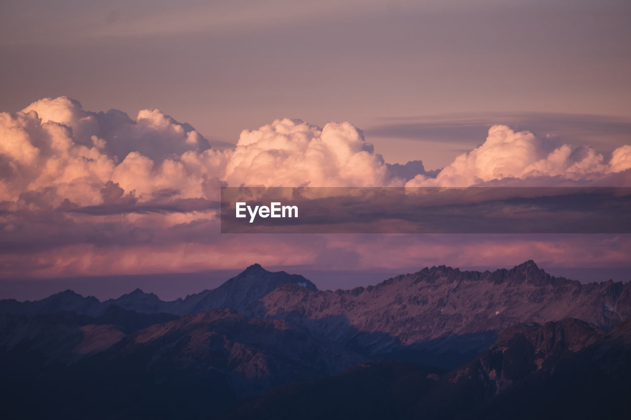 Scenic view of mountains against sky during sunset