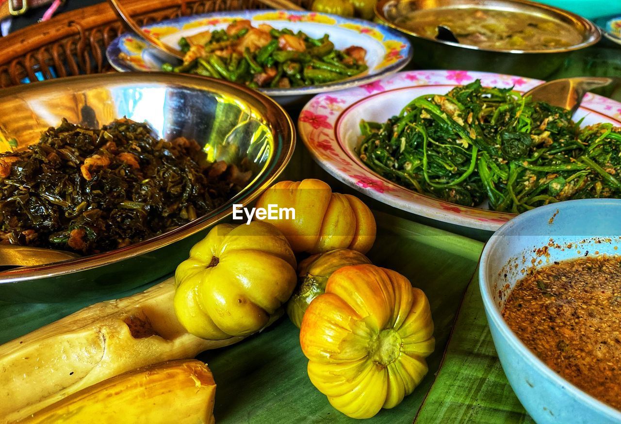 food, food and drink, dish, healthy eating, freshness, wellbeing, vegetable, cuisine, spice, no people, variation, bowl, produce, asian food, business, still life, market, high angle view, meal, indoors, abundance, plate, table, ingredient