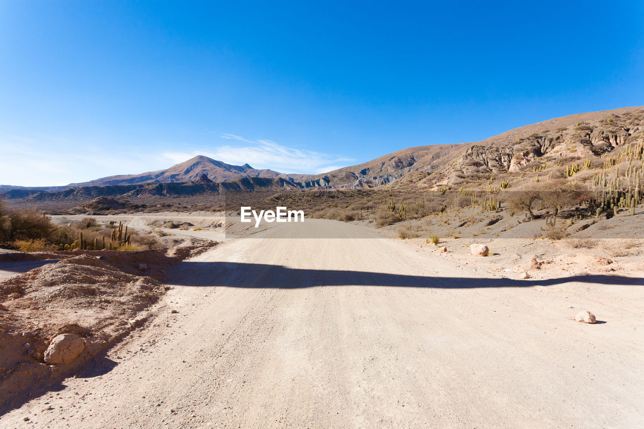 SCENIC VIEW OF DESERT AGAINST SKY