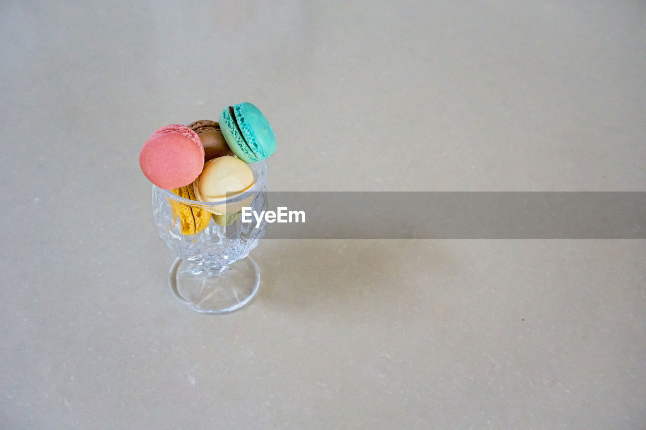 Mini macaron in a glass of goblet for background