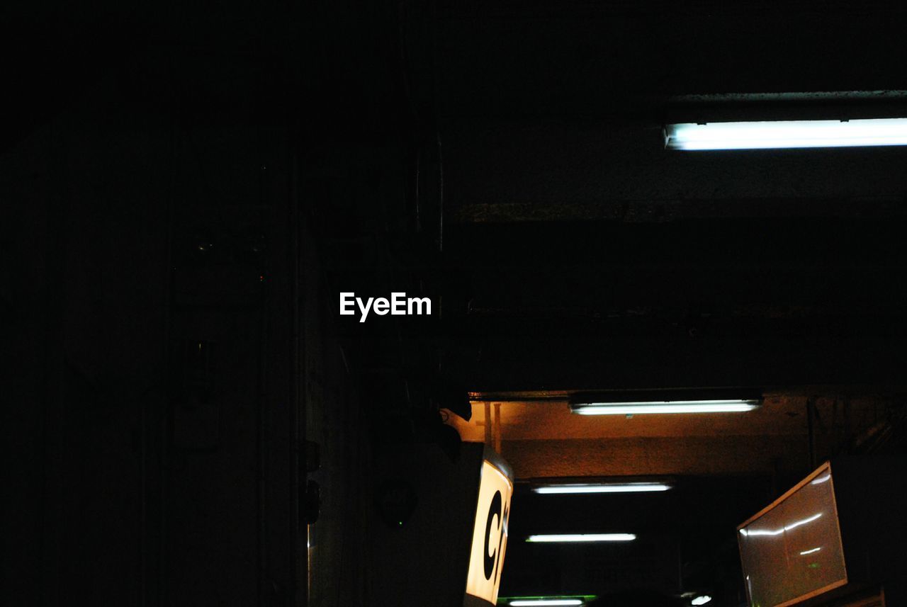 ILLUMINATED SUBWAY STATION IN DARKROOM