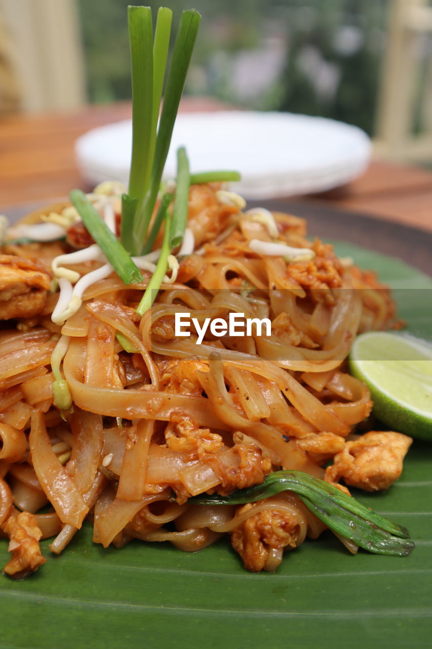 Close-up of pad thai served on table