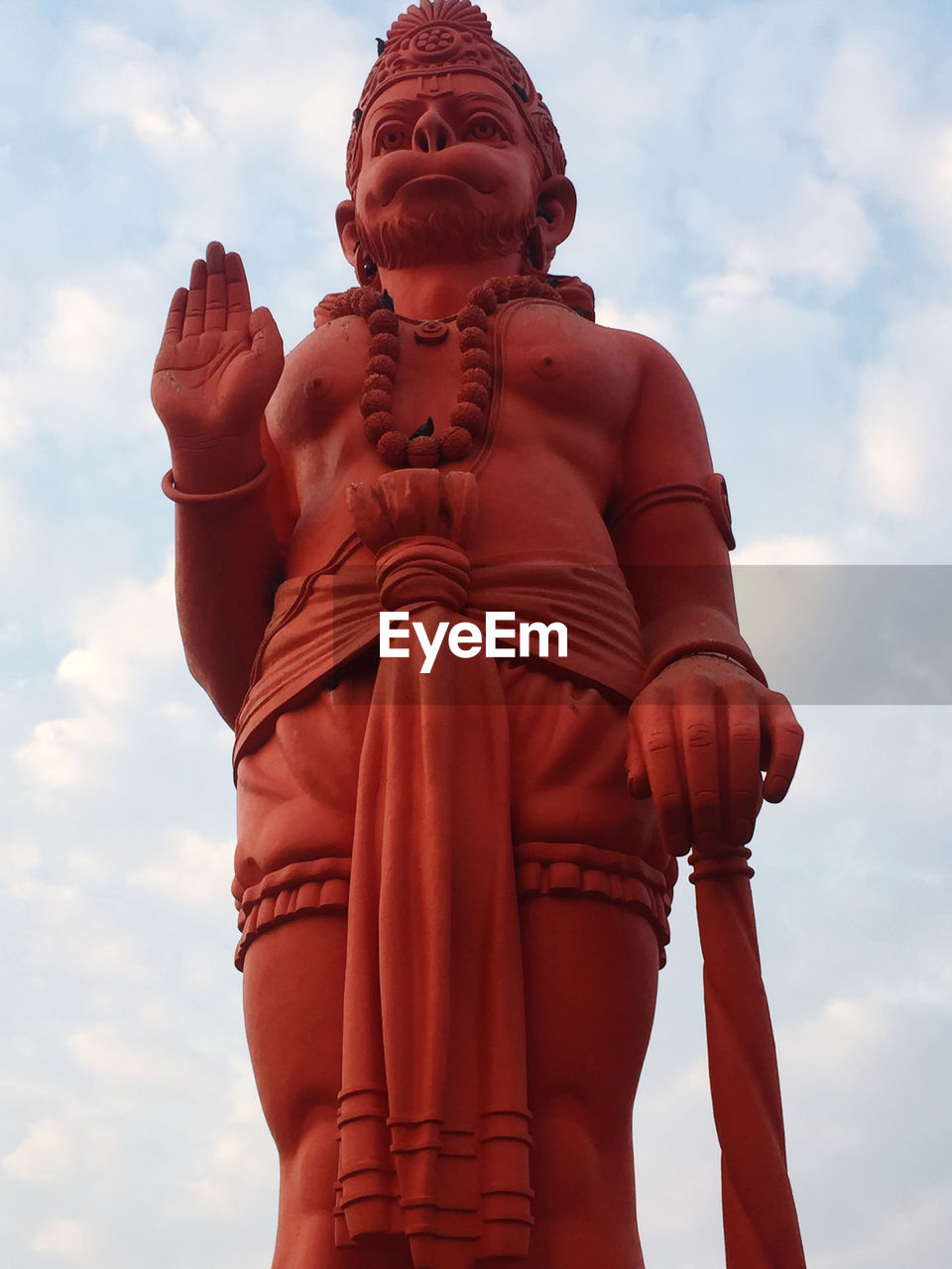 Low angle view of statue against sky