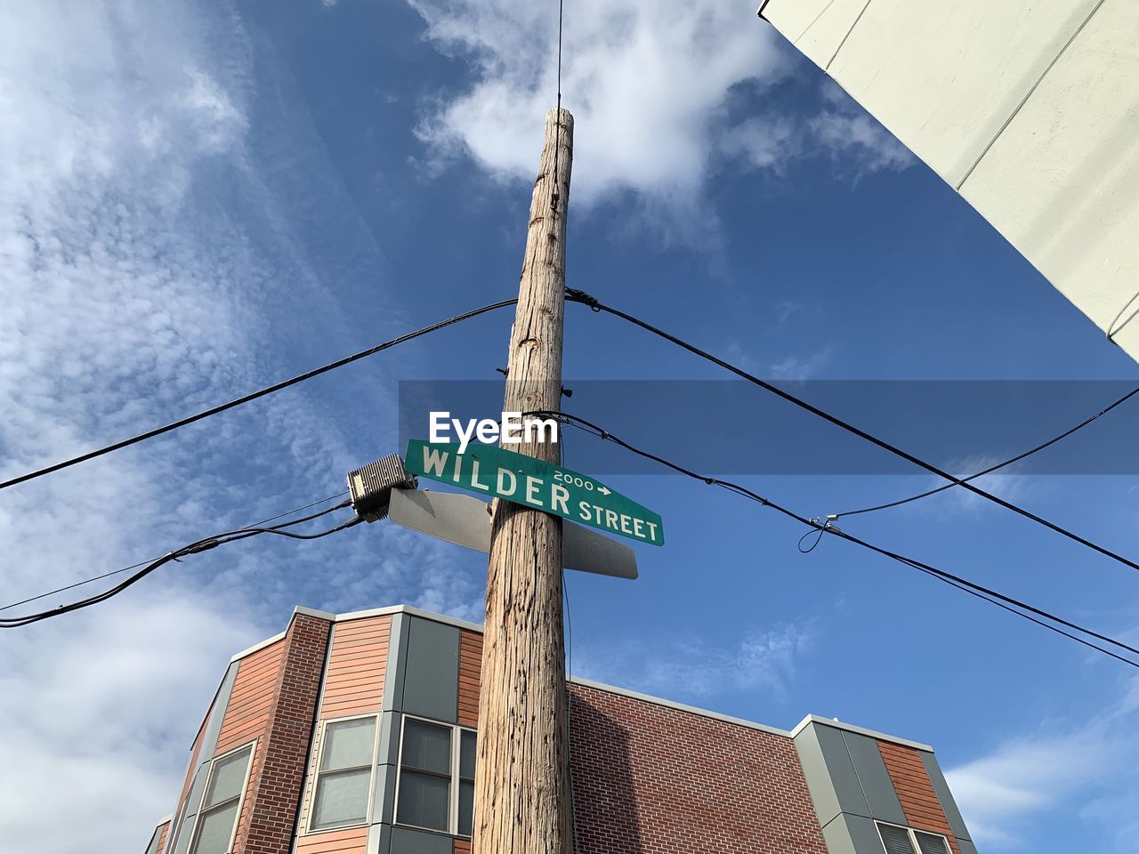 LOW ANGLE VIEW OF ROAD SIGN AGAINST SKY