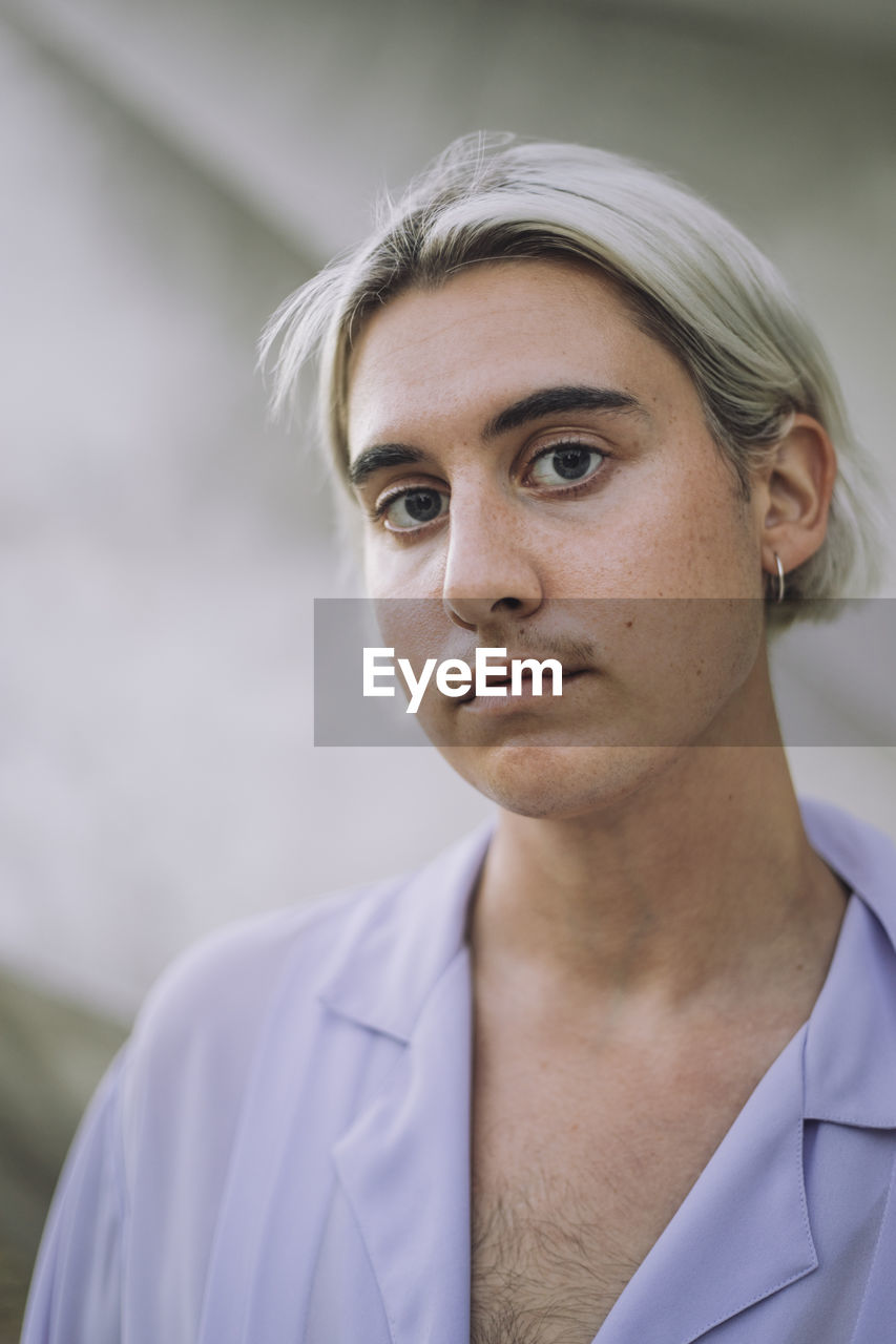 Portrait of non-binary person with medium-length hair