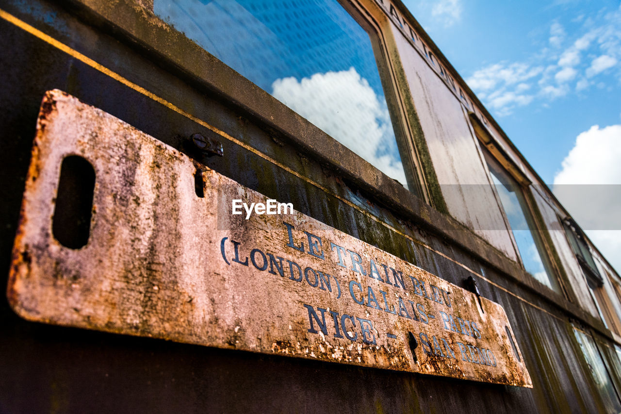 LOW ANGLE VIEW OF OLD RUSTY METAL