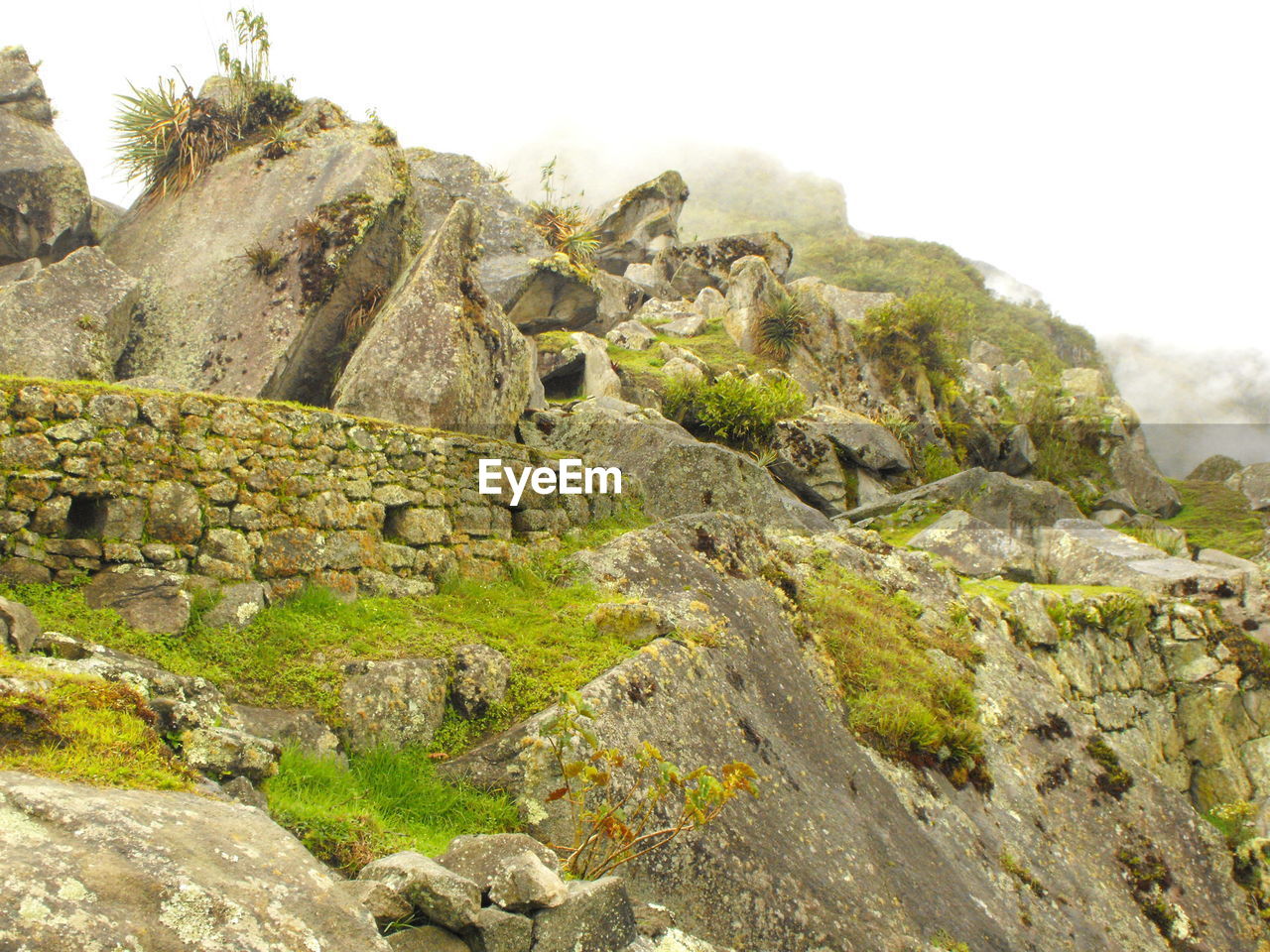 Old ruins at machu picchu against sky