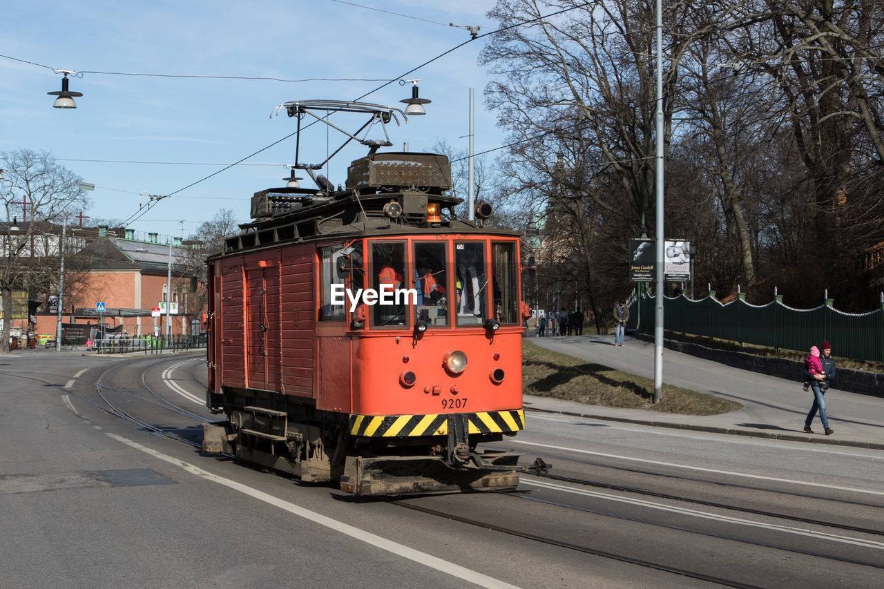 Engine of tram moving on road