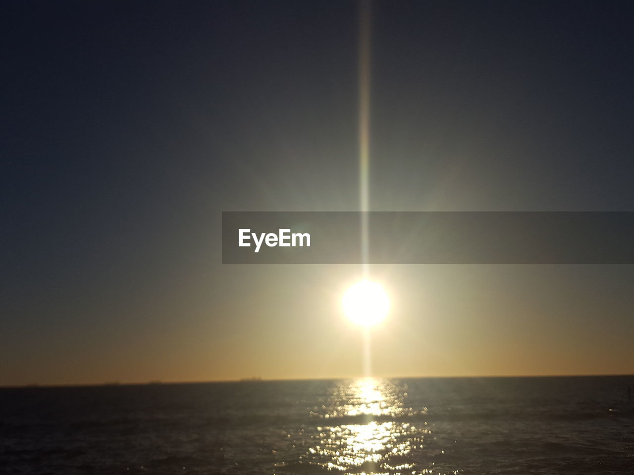 VIEW OF SEA AGAINST SKY DURING SUNSET