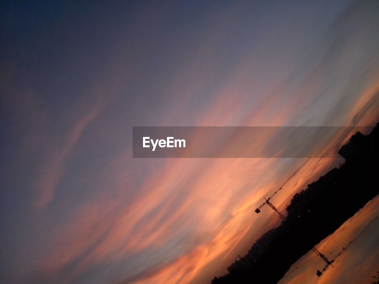 SCENIC VIEW OF SKY OVER SILHOUETTE TREES AGAINST SUNSET