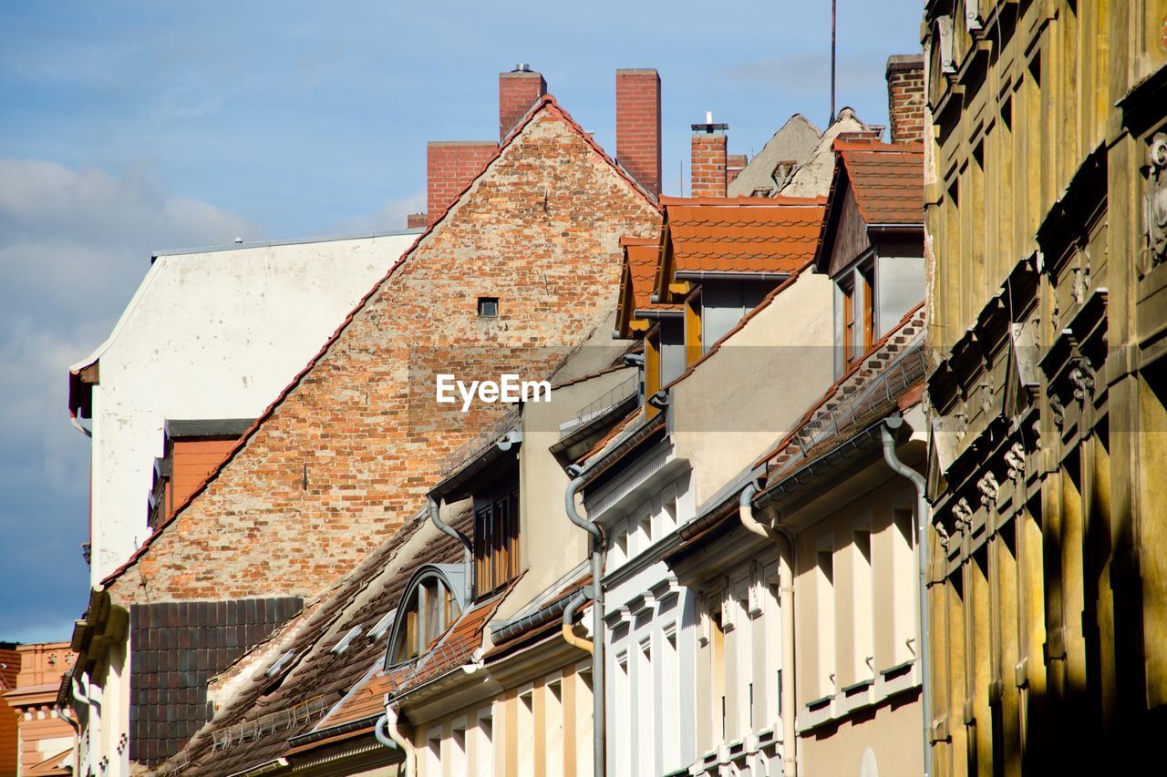 LOW ANGLE VIEW OF BUILDINGS IN TOWN