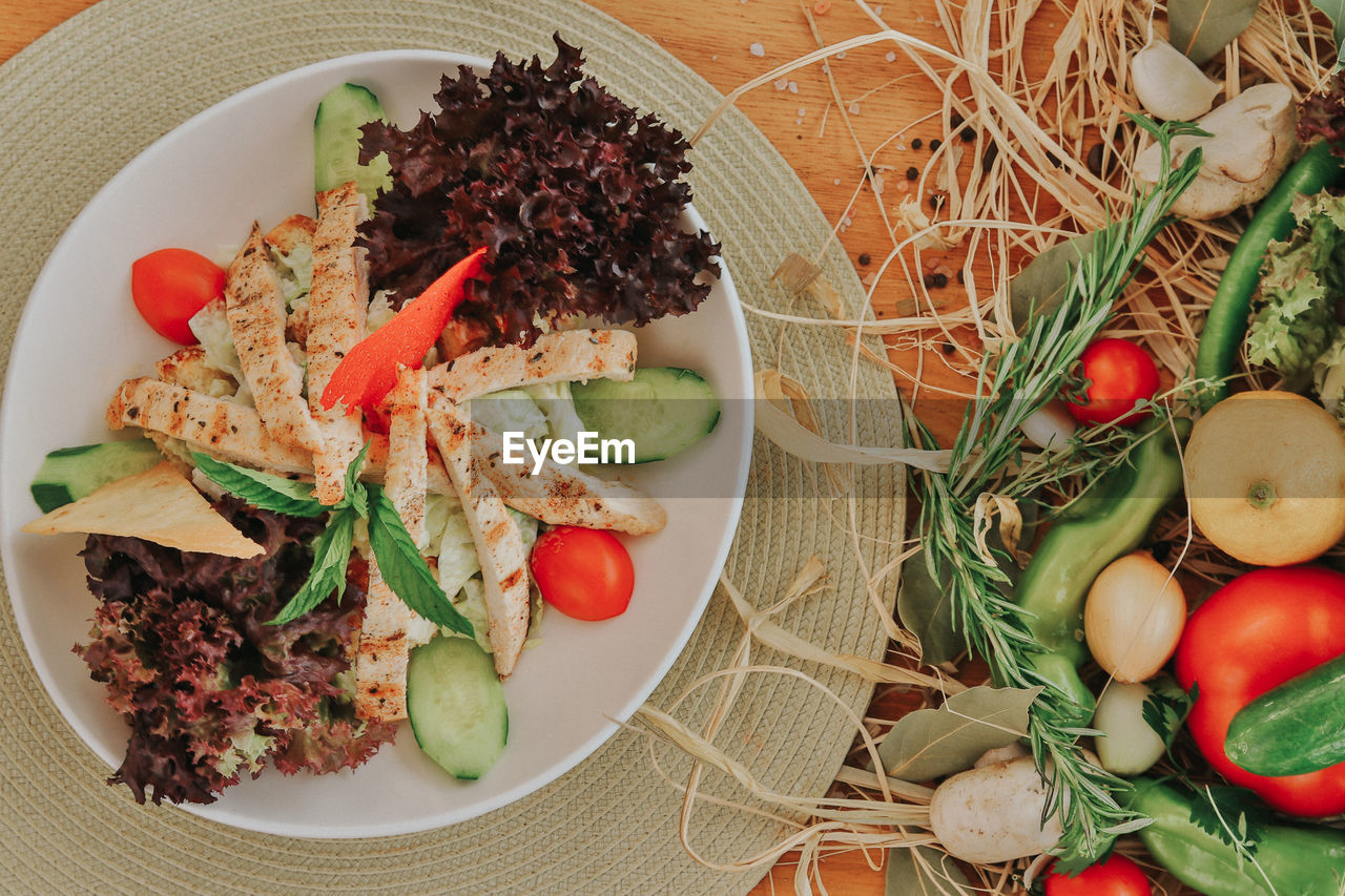 High angle view of salad in bowl on table