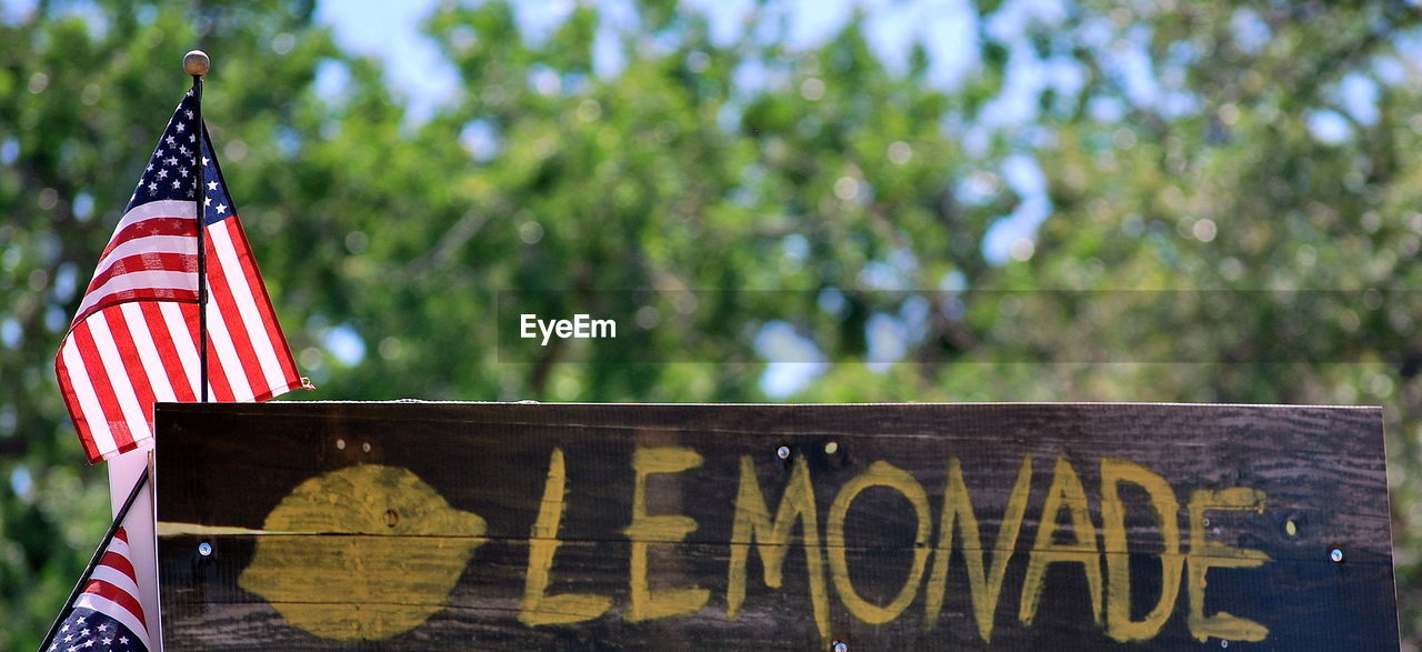 Lemonade stand displayed outdoors.