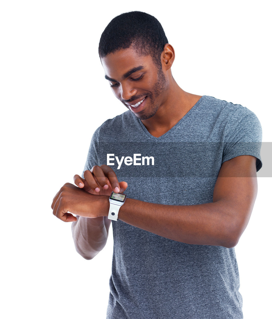 one person, finger, white background, arm, adult, hand, cut out, studio shot, young adult, casual clothing, smiling, men, indoors, happiness, sleeve, emotion, lifestyles, standing, t-shirt, person, relaxation, clothing, looking, cheerful, holding, waist up, positive emotion, portrait, copy space