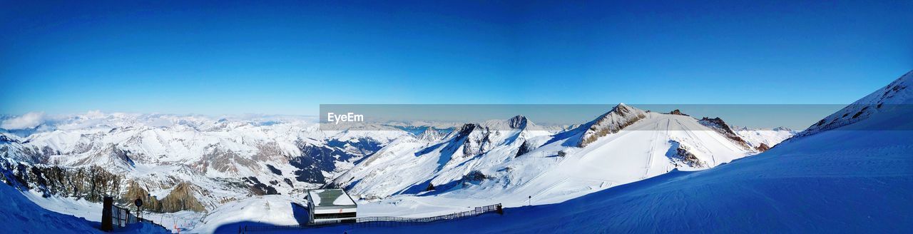 Snow covered mountain against clear sky