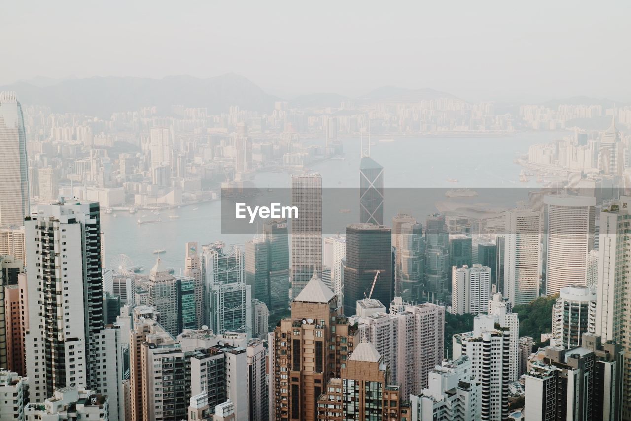 High angle view of buildings in city against sky