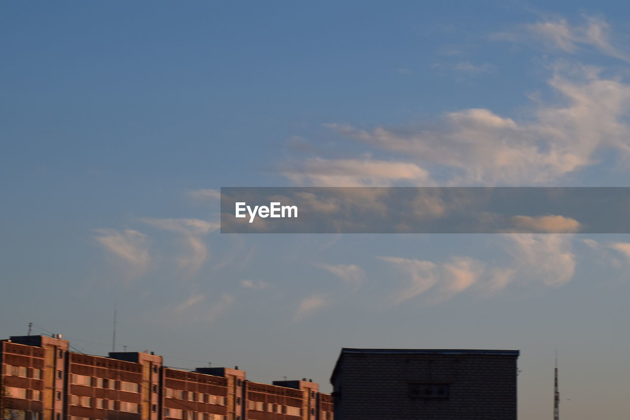 BUILDINGS AGAINST SKY