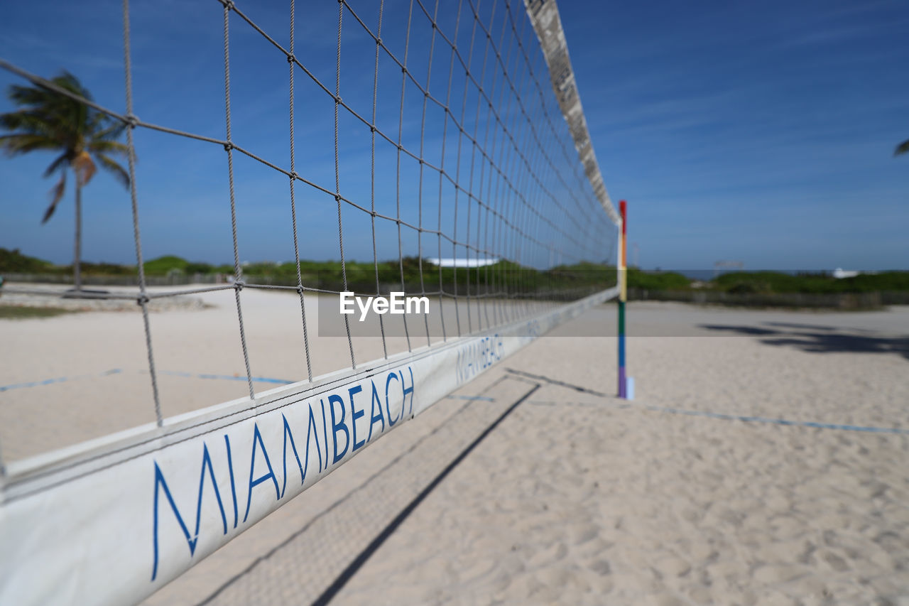 Beach volleyball net and blue sky