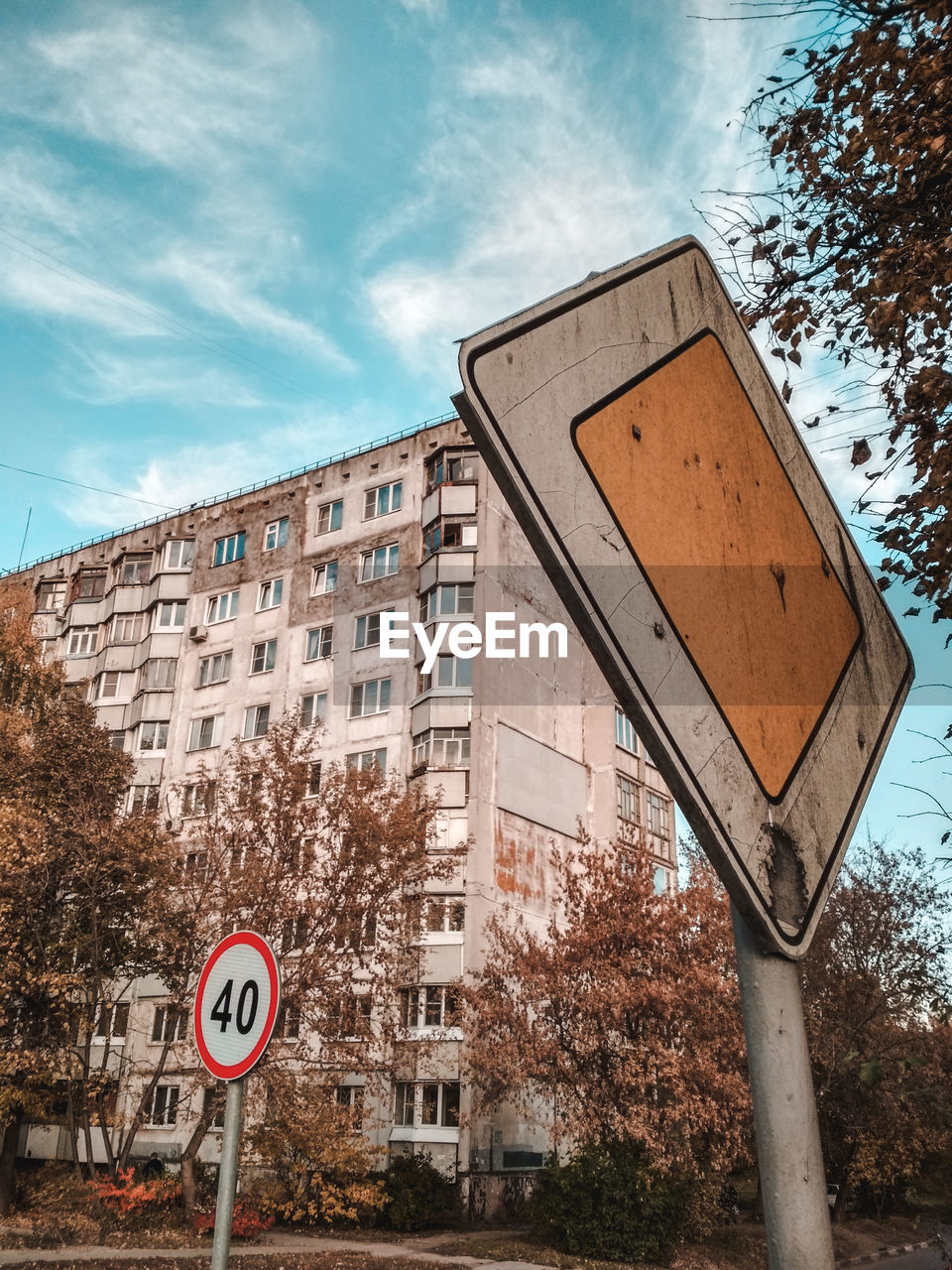 ROAD SIGN AGAINST SKY