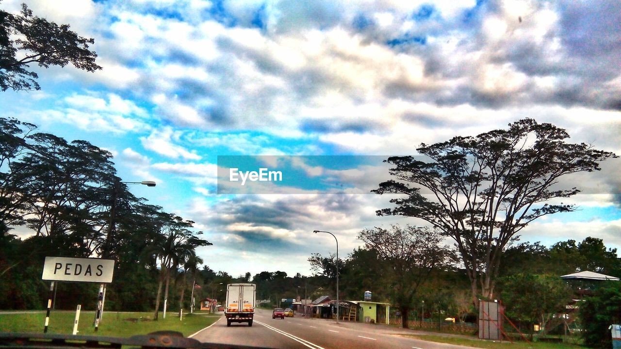 ROAD PASSING THROUGH LANDSCAPE