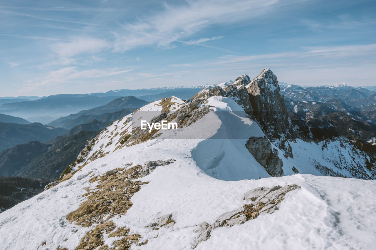 Scenic view of snow capped mountains against sky, hiking to tolsta kosuta