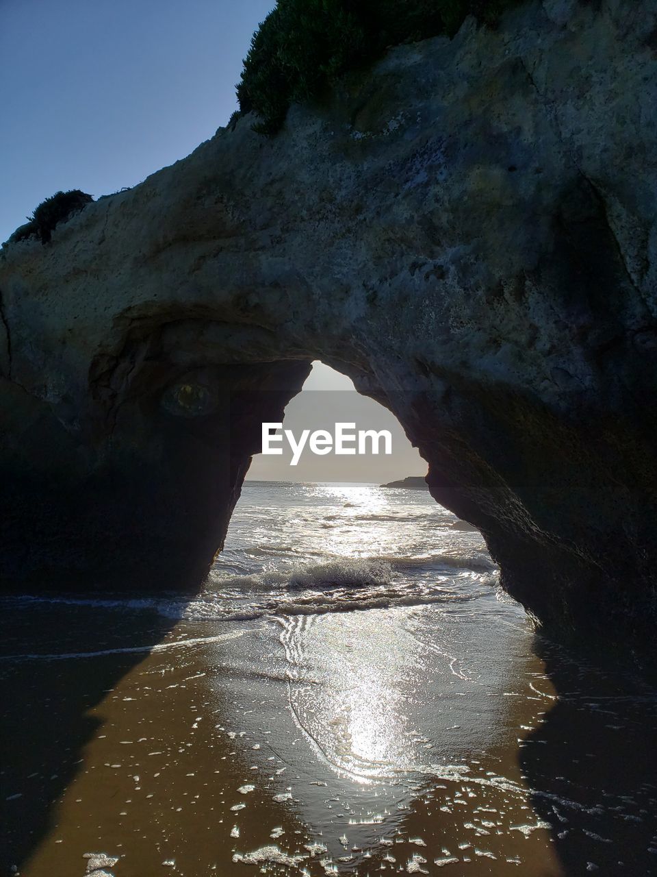 SEA SEEN THROUGH ROCK FORMATION