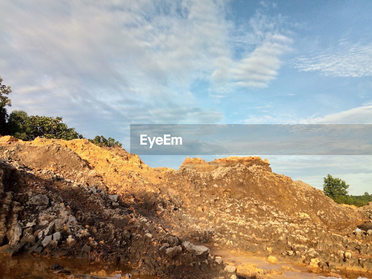 Low angle view of rock formation against sky