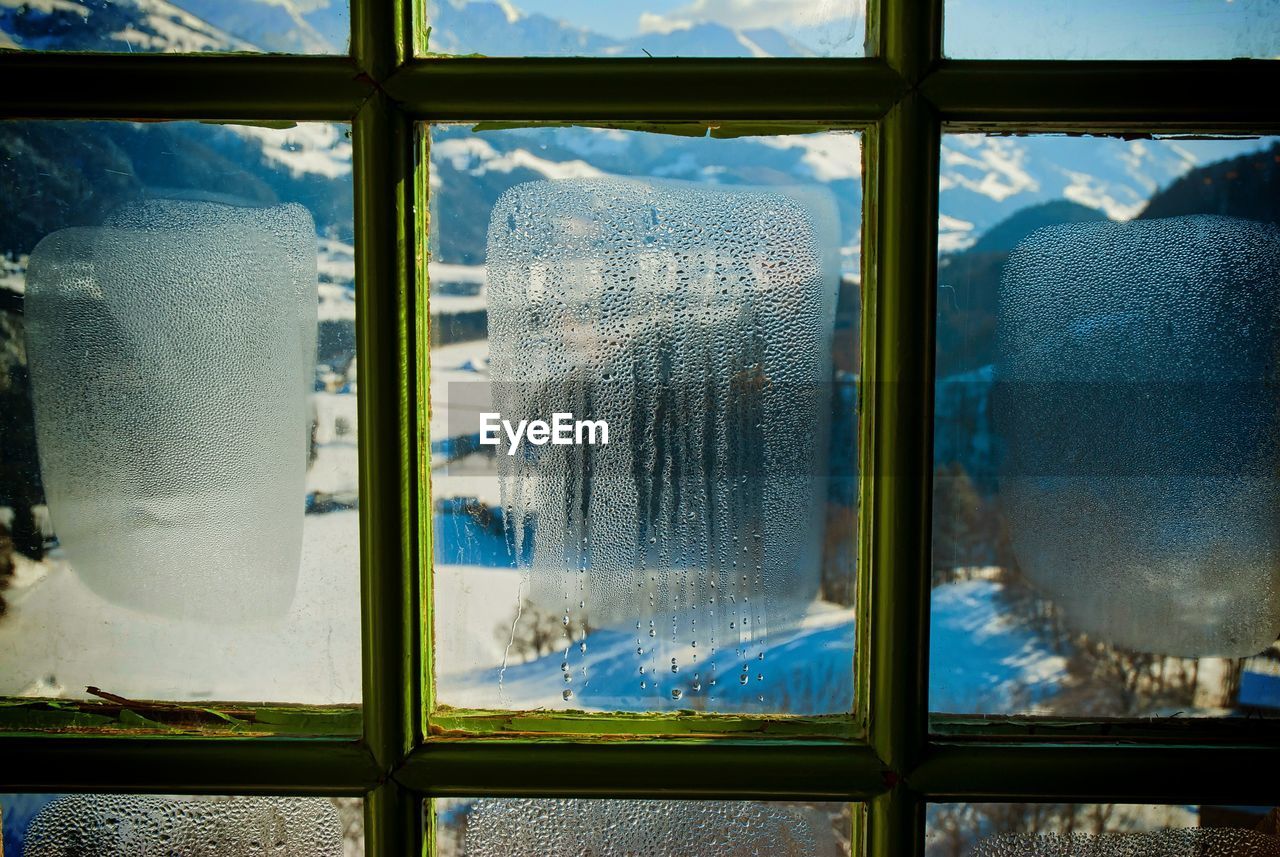 Glass window with condensation during winter