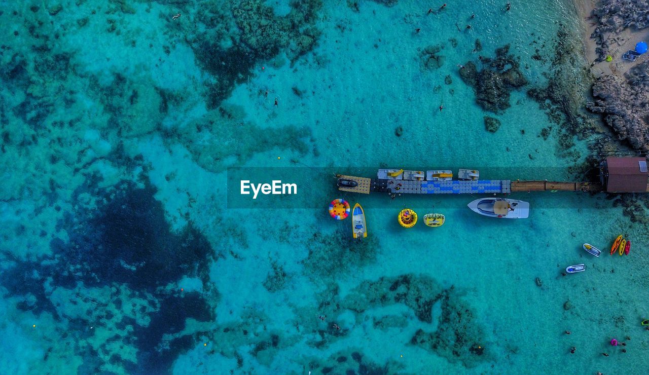 Aerial view of boats floating on sea