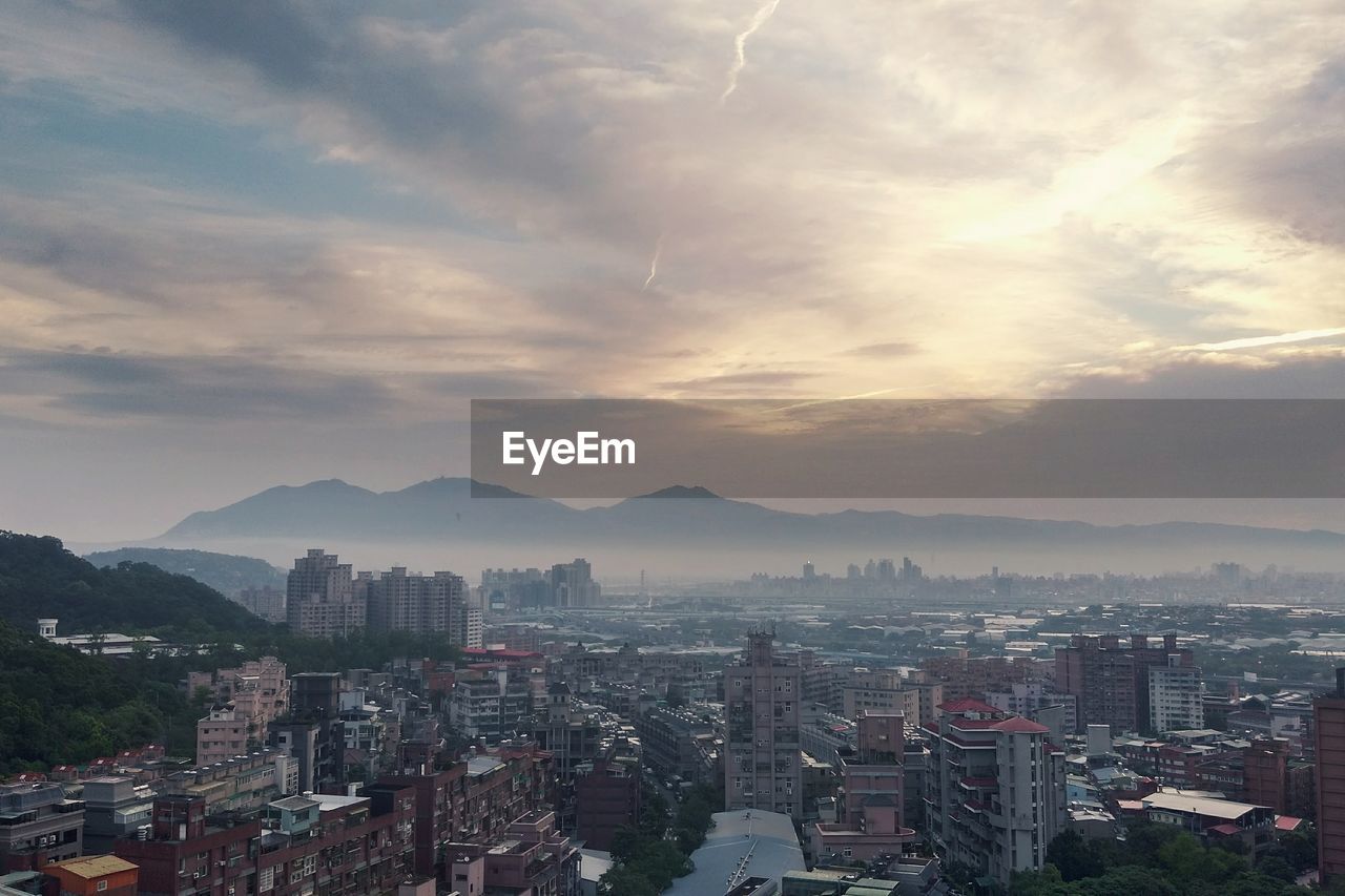 High angle view of city at dusk