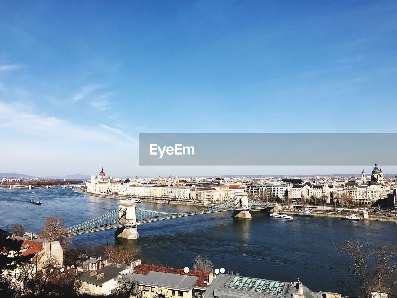 HIGH ANGLE VIEW OF BRIDGE OVER RIVER