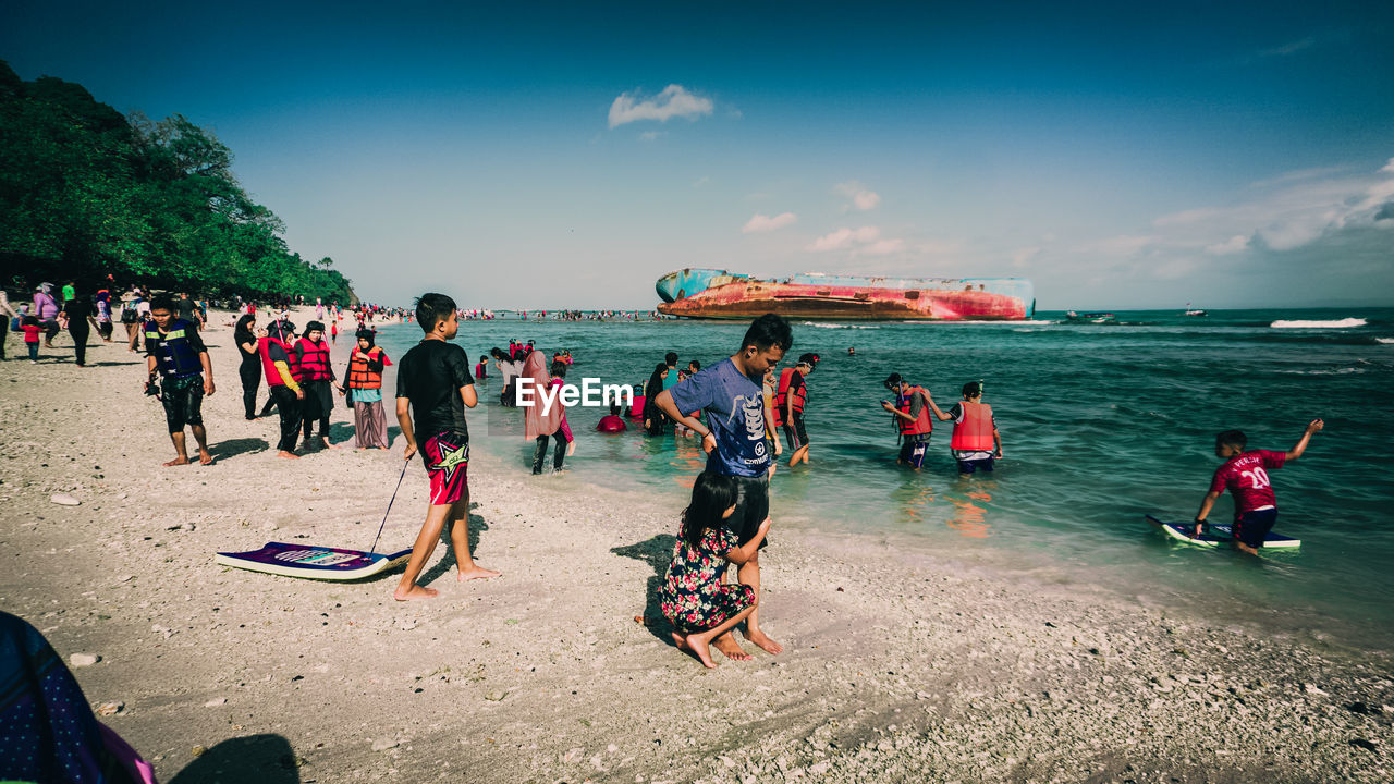 PEOPLE ON BEACH