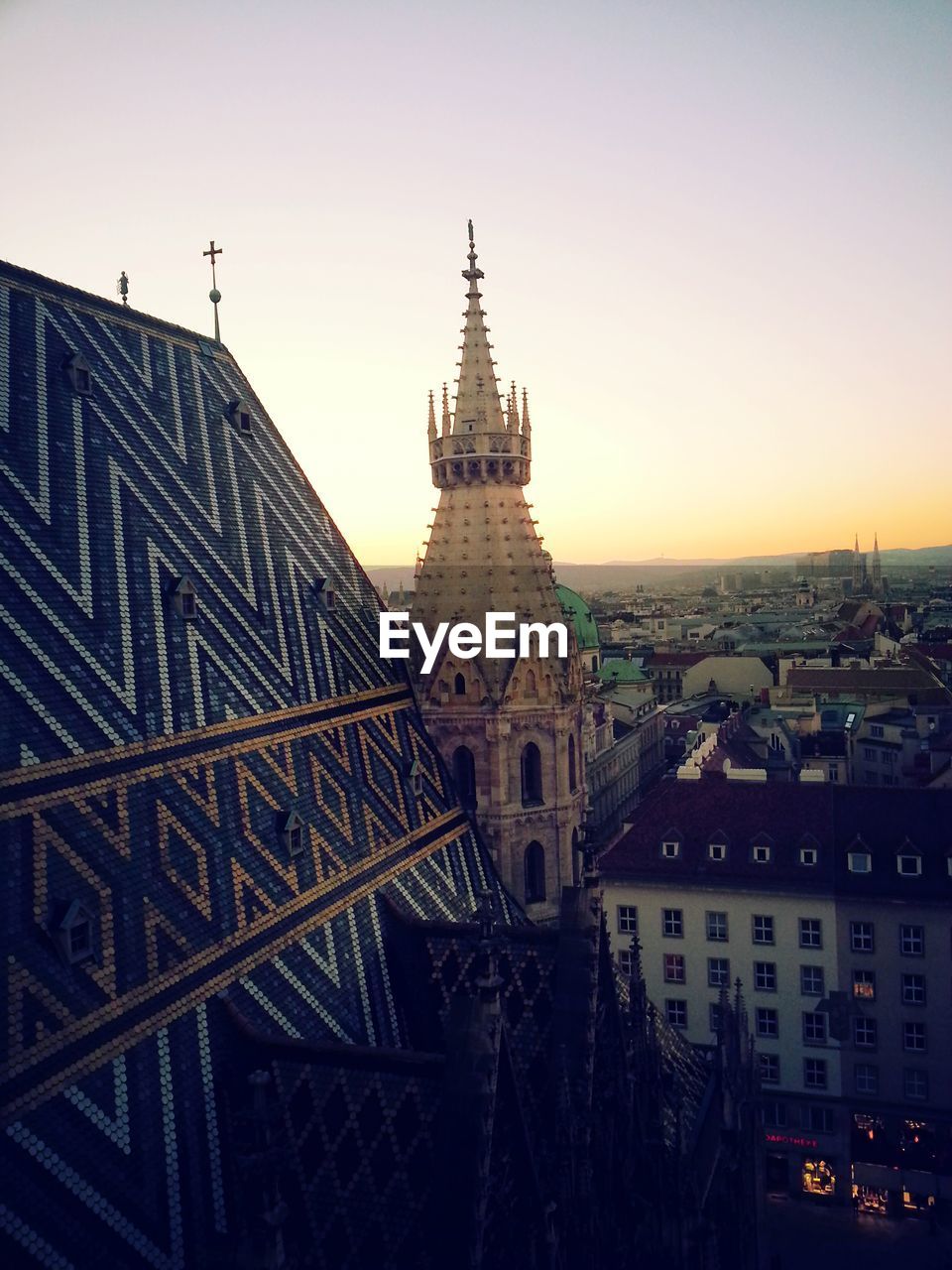 VIEW OF BUILDINGS IN CITY AGAINST SKY