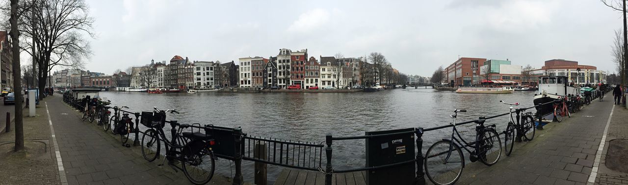 RIVER WITH BUILDINGS IN BACKGROUND