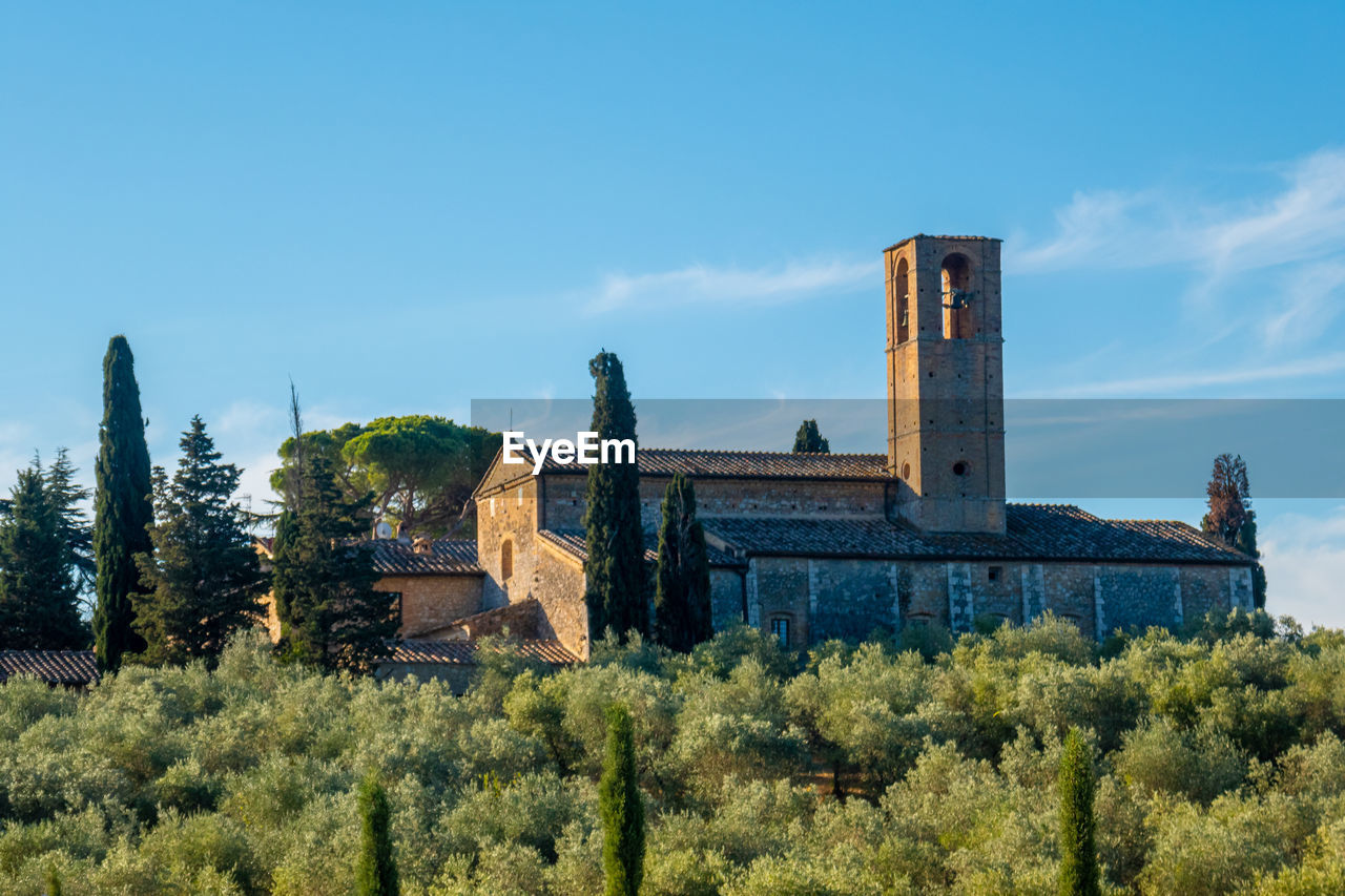 Skyline of monte oliveto abbey near little town of san gimignano, tuscany