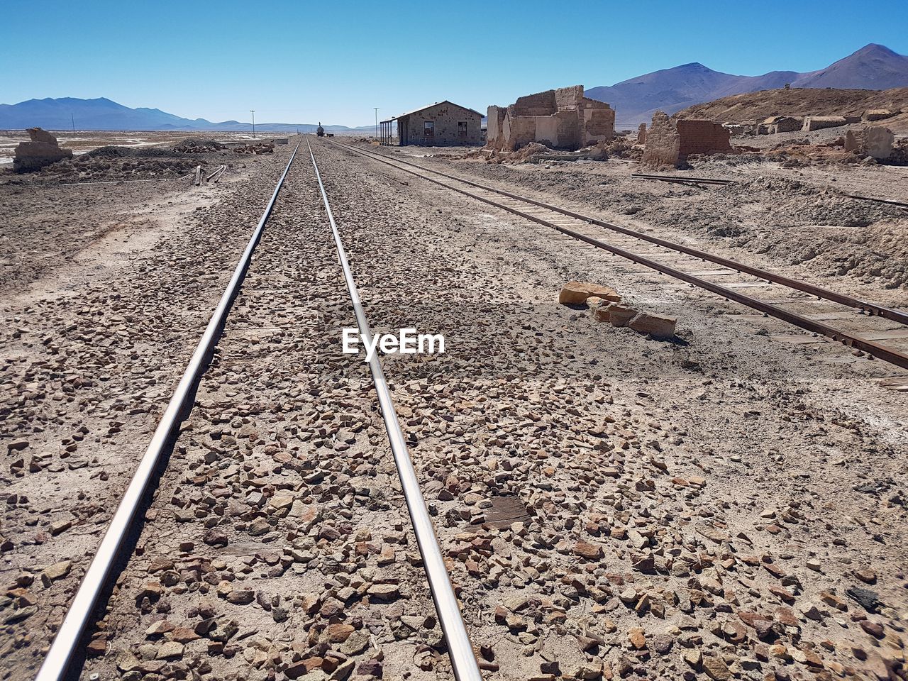 SURFACE LEVEL OF RAILROAD TRACKS AGAINST SKY